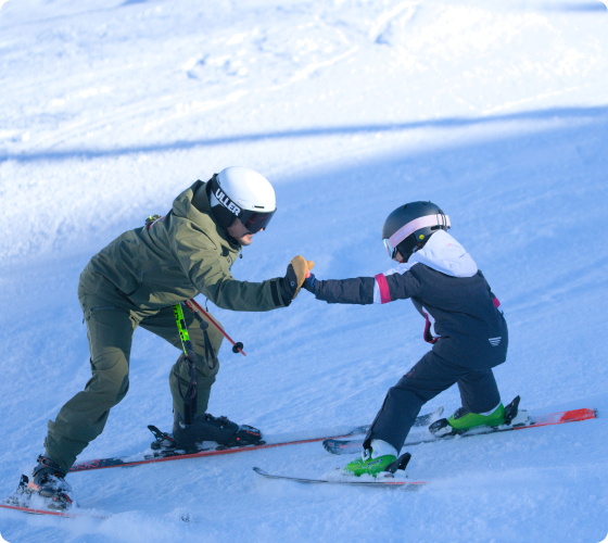 Instructor enseñando esquí en Baqueira